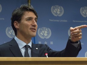 Canadian Prime Minister Justin Trudeau recognizes a journalist as he takes an additional question during a news conference at the United Nations Headquarters in New York City, Thursday September 21, 2017. THE CANADIAN PRESS/Adrian Wyld