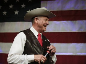 Former Alabama Chief Justice and U.S. Senate candidate Roy Moore speaks at a rally Monday, Sept. 25, 2017, in Fairhope, Ala.