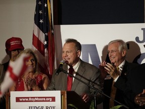 Former Alabama Chief Justice and U.S. Senate candidate Roy Moore speaks during his election party, Tuesday, Sept. 26, 2017, in Montgomery, Ala. Moore won the Alabama Republican primary runoff for U.S. Senate on Tuesday, defeating an appointed incumbent backed by President Donald Trump and allies of Sen. Mitch McConnell. (AP Photo/Brynn Anderson)