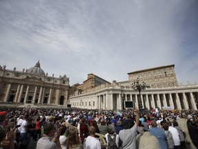 Faithful and pilgrims crowd St.Peter's Square at the Vatican during the Angelus noon prayer led by Pope Francis, Sunday, Sept. 24, 2017. (AP Photo/Alessandra Tarantino)