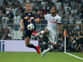 Besiktas' Ricardo Quaresma, right , vies for the ball with RB Leipzig's Marcel Halstenberg during the Champions League group G soccer match between Besiktas and RB Leipzig at the Vodafone Park Stadium in Istanbul, Tuesday, Sept. 26, 2017. (AP Photo0