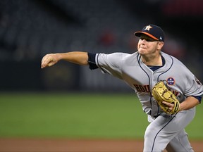 Houston Astros starting pitcher Brad Peacock throws to a Los Angeles Angels batter during the first inning of a baseball game Thursday, Sept. 14, 2017, in Anaheim, Calif. (AP Photo/Mark J. Terrill)