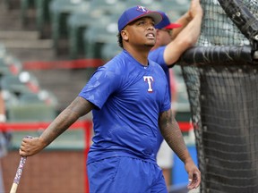 Texas Rangers' Willie Calhoun watches batting practice before the team's baseball game against the Seattle Mariners on Tuesday, Sept. 12, 2017, in Arlington, Texas. Calhoun, the prized prospect the Rangers got in the Yu Darvish trade, is set for his major league debut. (AP Photo/Tony Gutierrez)