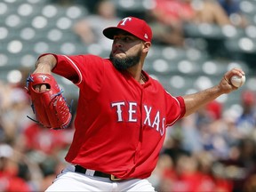 Texas Rangers starting pitcher Martin Perez (33) throws to the Los Angeles Angels in the first inning of a baseball game, Sunday, Sept. 3, 2017, in Arlington, Texas. (AP Photo/Tony Gutierrez)