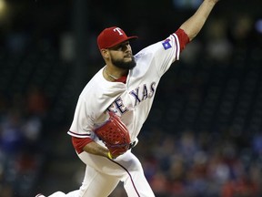 Texas Rangers starting pitcher Martin Perez throws during the first inning of a baseball game against the Oakland Athletics in Arlington, Texas, Friday, Sept. 29, 2017. (AP Photo/LM Otero)