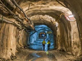 In this undated photo provided on Monday, Sept. 11, 2017, by Hellas Gold company, employees work inside a gold mine complex in Skouries, in the Halkidiki peninsula, northern Greece. Canadian mining company Eldorado Gold on Monday threatened to suspend a major investment in Greece in ten days, accusing the government of delaying permits and licenses. (Hellas Gold via AP)