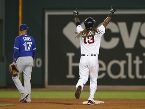 Boston Red Sox DH Hanley Ramirez celebrates his 19th-inning, game-winning single against the Toronto Blue Jays early on Sept. 6.