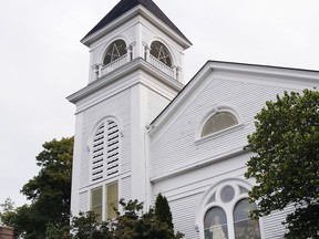 This Wednesday, Sept. 6, 2017 photo shows the Acton Congregational Church in Acton, Mass. The Massachusetts Supreme Judicial Court will hear arguments Thursday whether the town is improperly permitting taxpayer-funded community preservation grants to be used for renovations to the church building. (AP Photo/Bill Sikes)