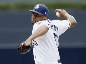 San Diego Padres starting pitcher Luis Perdomo throws to the plate against the St. Louis Cardinals during the first inning of a baseball game in San Diego, Monday, Sept. 4, 2017. (AP Photo/Alex Gallardo)