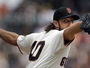 San Francisco Giants pitcher Madison Bumgarner works against the St. Louis Cardinals in the first inning of a baseball game, Sunday, Sept. 3, 2017, in San Francisco. (AP Photo/Ben Margot)