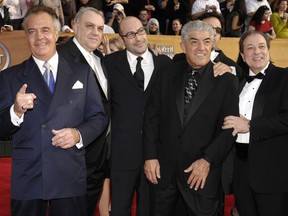 FILE - In this Jan. 28, 2007 file photo, Tony Sirico, left, Vincent Curatola, second from left, John Ventimiglia, center, Frank Vincent, third from right, Robert Funaro, second from right, and Dan Grimaldi, from television's "The Sopranos," arrive at the 13th Annual Screen Actors Guild Awards in Los Angeles. Vincent, a veteran character actor who often played tough guys including mob boss Phil Leotardo on "The Sopranos," has died. He was 80. (AP Photo/Chris Pizzello, File)