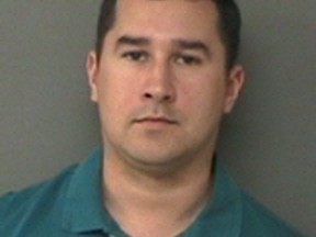 FILE - This Jan. 7, 2016 file photo released by the Waller County Sheriff's Office in Hempstead, Texas, shows former Texas State Trooper Brian Encinia, after his arrest on a perjury charge. The misdemeanor perjury charge was dismissed against the fired Texas state trooper in a case arising from his 2015 arrest of Sandra Bland, a black woman who was later found dead in a county jail. A state investigation of the white state trooper's actions in the arrest of Bland, a black motorist who later died in custody, found that the trooper was rude toward Bland and failed to follow standard procedures in his handling of the woman. (Waller County Sheriff's Office via AP, File)