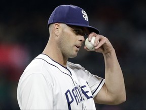 San Diego Padres starting pitcher Clayton Richard reacts in between facing Colorado Rockies batters during the third inning of a baseball game Thursday, Sept. 21, 2017, in San Diego. (AP Photo/Gregory Bull)