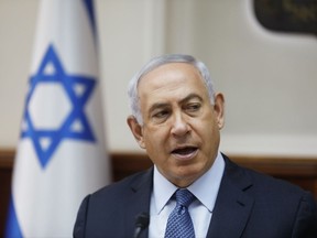 Israeli Prime Minister Benjamin Netanyahu attends the weekly cabinet meeting in Jerusalem Sunday, Sept. 10, 2017. (Ronen Zvulun/Pool Photo via AP)