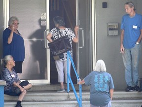 Caldwell First Nation chief Louise Hillier is pictured returning inside to where an ongoing general membership meeting was held in Leamington on Sept. 23, 2017, regarding a forensic audit into a powwow held by the band in August 2016.