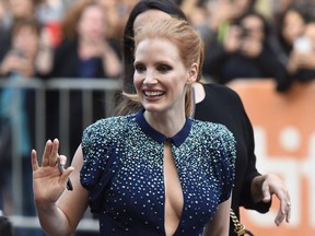 Jessica Chastain waives as she attends a premiere for "Molly's Game" on day 2 of the Toronto International Film Festival at the Elgin Theatre on Friday, Sept. 8, 2017, in Toronto. (Photo by Chris Pizzello/Invision/AP)