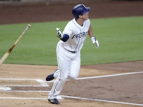 San Diego Padres' Hunter Renfroe throws his bat as he watches his three-run home run during the first inning of a baseball game against the Arizona Diamondbacks, Monday, Sept. 18, 2017, in San Diego. (AP Photo/Orlando Ramirez)