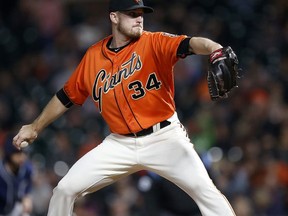 San Francisco Giants pitcher Chris Stratton works against the San Diego Padres during the first inning of a baseball game Friday, Sept. 29, 2017, in San Francisco. (AP Photo/Tony Avelar)