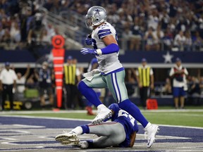 Dallas Cowboys tight end Jason Witten (82) catches a touchdown pass in front of New York Giants cornerback Eli Apple (24) in the first half of an NFL football game, Sunday, Sept. 10, 2017, in Arlington, Texas. (AP Photo/Ron Jenkins)