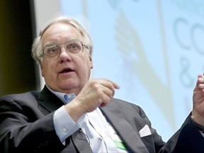 FILE - In this Feb. 2014, file photo, philanthropist Howard G. Buffett, son of investor Warren Buffett, speaks in Omaha, Neb. Howard G. Buffett is to be sworn in to office Friday Sept. 15, 2017 as the interim sheriff of Macon County in central Illinois. Macon County Sheriff Thomas Schneider said in a Friday statement that he is retiring early. Buffett has been a Macon County undersheriff since September 2014 and has completed more than 3,300 hours of patrol and training. (AP Photo/Nati Harnik, File)