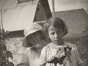 This 1933 photo provided by Sylvain Jaussaud, shows Vivian Maier at around age 7 with her mother in Haute-Alpes, France, where she spent much of her childhood. New research about Vivian Maier shows the enigmatic Chicago nanny was obsessive about honing her skills as a photographer starting in 1950. (Courtesy of Sylvain Jaussaud via AP)