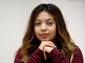 FILE - In this Nov. 17, 2016 file photo, Andrea Aguilera sits at the Erie Neighborhood House in Chicago. Aguilera was illegally brought across the Mexican border at age 4 and now is is a junior at Dominican University in suburban Chicago. She is one of nearly 800,000 young immigrants who received a reprieve from deportation under the Obama-era program known as Deferred Action for Childhood Arrivals, or DACA. Aguilera's DACA expires in July 2019. (AP Photo/Nam Y. Huh, File)