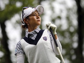 Ai Miyazato of Japan follows her ball after playing on the 10th hole during the first round of the Evian Championship women's golf tournament in Evian, eastern France, Thursday, Sept. 14, 2017. (AP Photo/Laurent Cipriani)