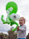 Declan Jagger, 2, plays with an octopus balloon animal given to him at a protest against a proposed balloon ban in Vancouver