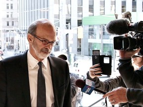 David Livingston, chief of staff to former Ontario premier Dalton McGuinty, arrives at court in Toronto on Monday, Sept. 11, 2017. Livingston and his deputy Laura Miller face allegations they illegally destroyed documents related to a government decision to scrap two gas plants ahead of 2011 provincial election. THE CANADIAN PRESS/Colin Perkel