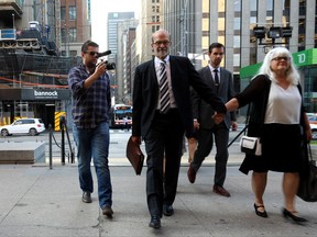 David Livingston, chief of staff to former Ontario premier Dalton McGuinty, arrives at court in Toronto on Friday, Sept. 22, 2017. Livingston and his deputy Laura Miller face allegations they illegally destroyed documents related to a government decision to scrap two gas plants ahead of 2011 provincial election.