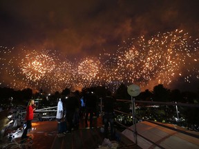 Fireworks fly over Simon Bolivar Park after a Mass officiated by Pope Francis in Bogota, Colombia, Thursday, Sept. 7, 2017. (AP Photo/Fernando Vergara)