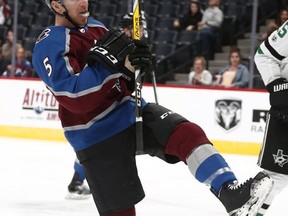 Colorado Avalanche defenseman David Warsofsky celebrates a goal against the Dallas Stars during the first period of a preseason NHL hockey game Thursday, Sept. 21, 2017, in Denver. (AP Photo/Jack Dempsey)