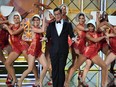Colbert dances onstage during the 69th Emmy Awards.