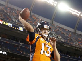 Denver Broncos quarterback Trevor Siemian (13) warms up prior to an NFL football game against the Los Angeles Chargers, Monday, Sept. 11, 2017, in Denver. (AP Photo/Jack Dempsey)