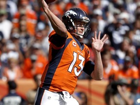 Denver Broncos quarterback Trevor Siemian (13) throws against the Dallas Cowboys during the first half of an NFL football game, Sunday, Sept. 17, 2017, in Denver. (AP Photo/Jack Dempsey)