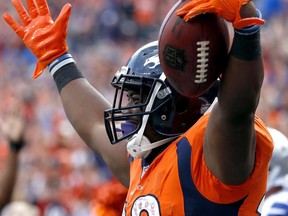 Denver Broncos running back C.J. Anderson (22) celebrates his touchdown against the Dallas Cowboys during the second half of an NFL football game, Sunday, Sept. 17, 2017, in Denver. (AP Photo/Jack Dempsey)
