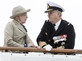 FILE - In this June.23 2017 file photo Denmark's Queen Margrethe and her husband Prince Henrik arrive by boat at Aarhus Harbour, Jutland.  The Denmark royal household says Wednesday Sept. 6, 2017, that Prince Henrik is suffering from dementia, and has undergone medical examinations at Copenhagen's university hospital over recent months. (Mikkel Berg Pedersen/AP via ritzau, file)