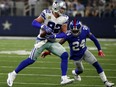 Jason Witten, left, of the Dallas Cowboys, hauls in a pass while being defended by New York Giants' Eli Apple during Week 1 NFL action Sunday in Dallas. Witten established a new franchise record for receiving yards as the Cowboys posted a 19-3 victory.