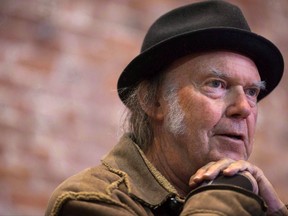 Canadian musician Neil Young speaks during a news conference in Vancouver, B.C., on Monday, November 23, 2015. Legendary artists Young and Bruce Cockburn were ushered into the Canadian Songwriters Hall of Fame on Saturday with a celebration that carried a few political undertones.THE CANADIAN PRESS/Darryl Dyck