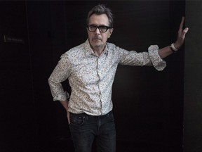 Gary Oldman poses for a photo as he promotes the film " Darkest Hour," at the Toronto International Film Festival in Toronto on Tuesday, September 12 , 2017. The celebrated British actor is unrecognizable in "Darkest Hour," where he is cloaked in prosthetic makeup to portray Winston Churchill in the early days of his term during the Second World War. THE CANADIAN PRESS/Chris Young