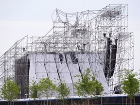 A collapsed stage is shown at a Radiohead concert at Downsview Park in Toronto on June 16, 2012. A judge in Toronto has stayed the charges stemming from a fatal Radiohead concert stage collapse in 2012 due to delays. THE CANADIAN PRESS/Nathan Denette