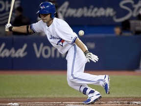 Toronto Blue Jays right fielder Norichika Aoki (23) hits a ground ball pop-up only to be caught out at first base during first inning AL MLB baseball action against the Tampa Bay Rays, in Toronto on August 16, 2017. Outfielder Nori Aoki agreed to a contract with the New York Mets on Saturday and was expected to join the team before its game at Houston. Aoki had a $5.5 million, one-year contract and was released Tuesday by Toronto. THE CANADIAN PRESS/Nathan Denette