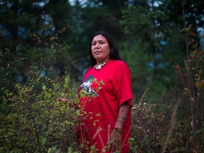 Kanahus Manuel poses for a photo near Chase, B.C., in this September 6 handout photo. Members of the Secwepemc Nation in British Columbia say they are building the first of 10 tiny homes that will be placed directly in the path of Kinder Morgan's $7.4-billion Trans Mountain pipeline expansion.Kanahus Manuel of the Secwepemc Women's Warrior Society says the house is a symbol of sustainability in the face of an environmentally damaging project and is based on homes built at the Standing Rock protest in the United States. THE CANADIAN PRESS/HO - Greenpeace
