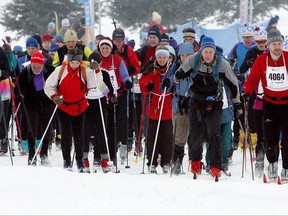 Cross-Country skiers take off from the start of the 42nd edition of the Canadian Ski Marathon in Gatineau, Que. on Saturday Feb. 9, 2008. One of Canada's most storied ski events is shifting further north partly due to concerns over climate change causing less snow on low-lying portions of its route. THE CANADIAN PRESS/Sean Kilpatrick