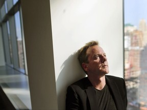 Actor and singer Kiefer Sutherland poses for a photo during an interview in New York to promote his debut album, "Down in a Hole," on Aug.13, 2016. After a tumultuous year, many people doubted that this unlikely U.S. president would still be in office. Yet here he stands, President Tom Kirkman - brought to life on the small screen by Sutherland, the star of "Designated Survivor." THE CANADIAN PRESS/AP/Julie Jacobson