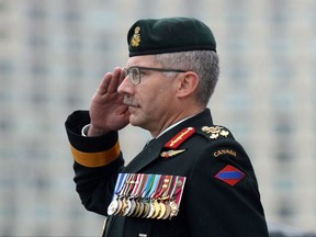 Lieutenant-General Paul Wynnyk salutes after assuming command of the Canadian Army from Lieutenant-General Marquis Hainse during a ceremony on Parliament Hill in Ottawa on Thursday July 14, 2016. Wynnyk is hoping the days of having to pinch pennies just to train his soldiers are over. Much of the attention around the Trudeau government's new defence policy has been focused on the large amounts of money promised for new equipment such as fighter jets and warships. THE CANADIAN PRESS/Sean Kilpatrick