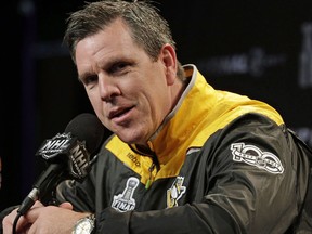 Pittsburgh Penguins head coach Mike Sullivan answers a question during a news conference at the NHL hockey Stanley Cup Finals Sunday, June 4, 2017, in Nashville, Tenn. Sullivan insists the franchise's decision to visit the White House does not mean the team is wading into the increasingly charged intersection of sports and politics. THE CANADIAN PRESS/AP/Chuck Burton