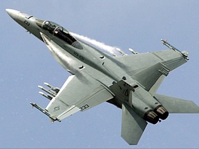 A Boeing F-18 Super Hornet performs during its demonstration flight, on the first day of the 47th Paris Air Show in Le Bourget, north of Paris, Monday June 18, 2007. The U.S. State Department has told Congress that it has no concerns about the potential sale of 18 Super Hornet fighter jets to Canada, with a price tag estimated at US$5.23 billion. THE CANADIAN PRESS/AP Photo/Remy de la Mauviniere