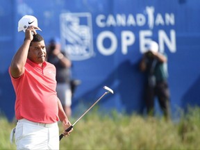 Jhonattan Vegas of Venezuela tips his cap as he finishes his final round of the 2017 Canadian Open at the Glen Abbey Golf Club in Oakville, Ont., on Sunday, July 30, 2017. A plan to demolish the historic Glen Abbey golf course despite its heritage status goes before an Ontario town council tonight. Glen Abbey's owner ClubLink filed an application Monday to demolish or remove the golf course and some buildings to make way for a mix of homes, offices and stores. THE CANADIAN PRESS/Nathan Denette