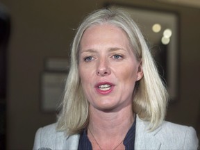 Environment Minister Catherine McKenna talks with reporters before the morning session as the Liberal cabinet meets in St. John's, N.L. on Wednesday, Sept. 13, 2017. McKenna says the United States has provided no new information about what it would take to entice it back into the Paris climate change accord. THE CANADIAN PRESS/Andrew Vaughan